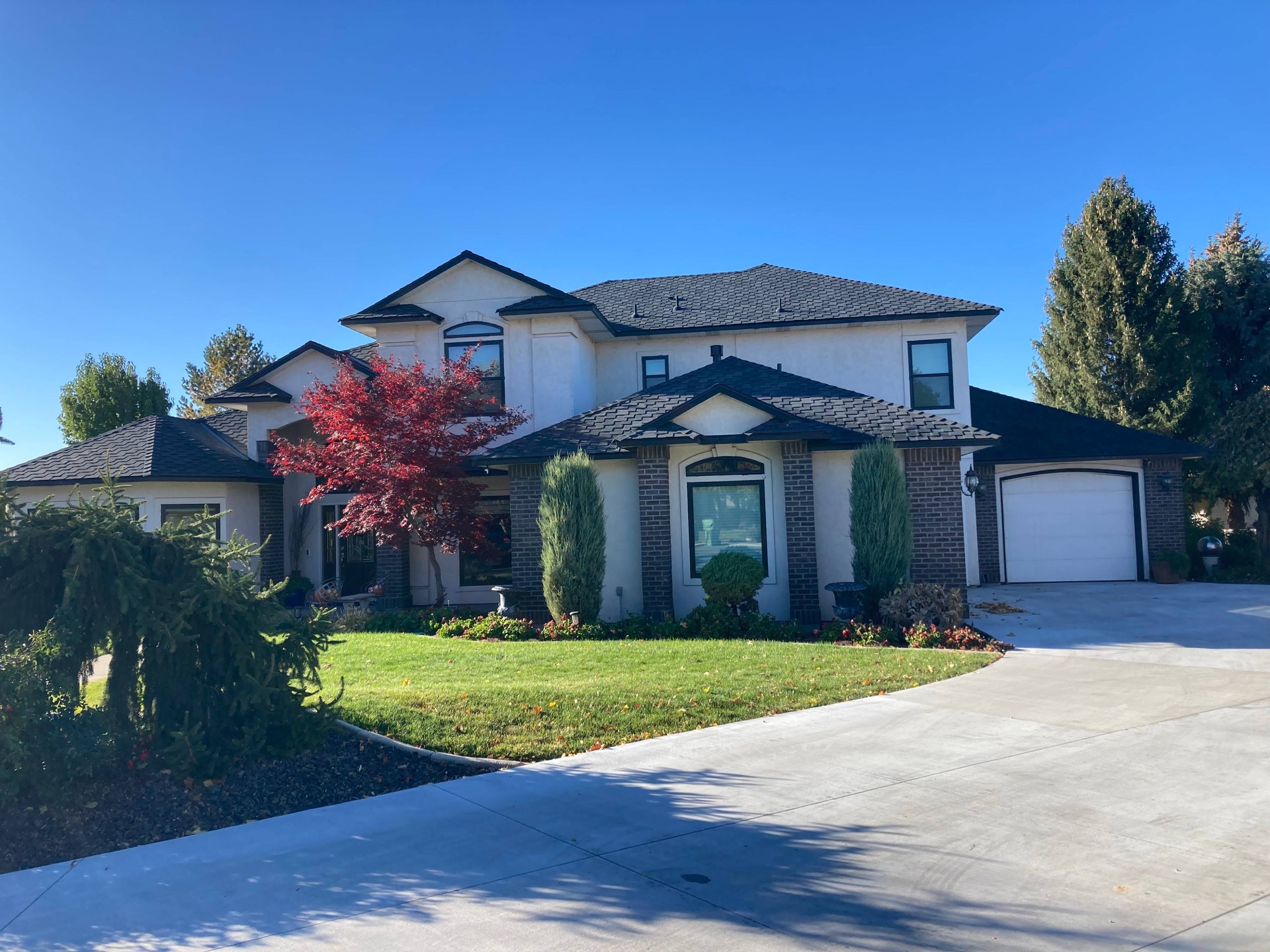 Roofers on roof in Boise, Idaho