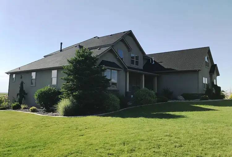 Roofers on roof in Boise, Idaho